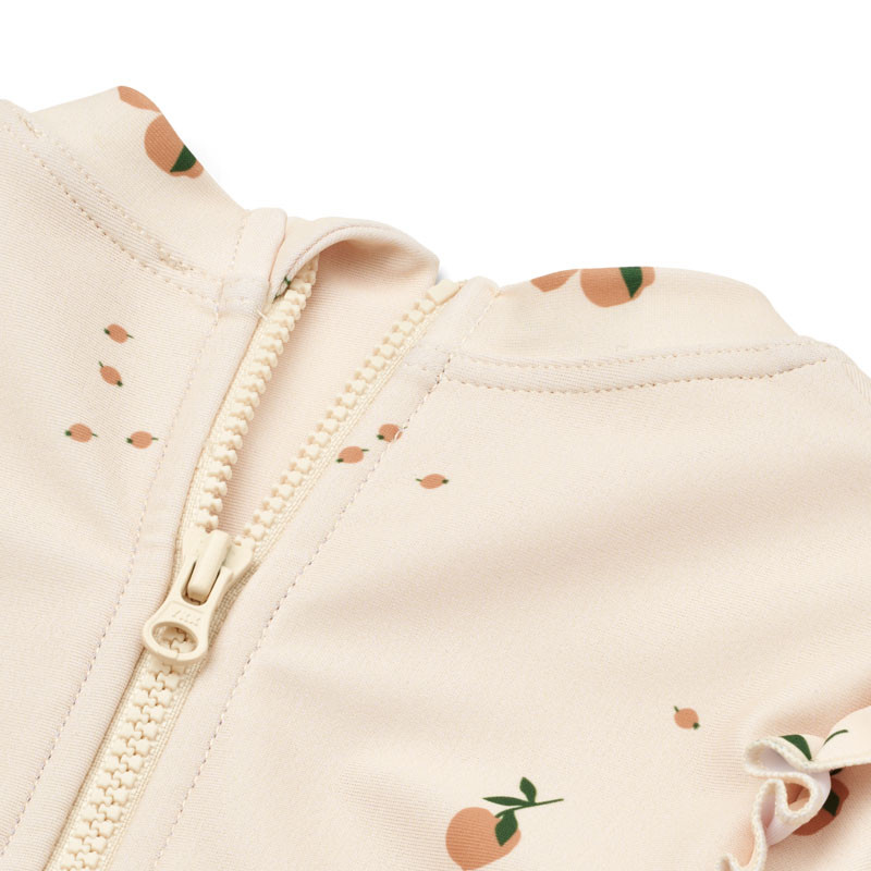 LIEWOOD Sille Baby-Badeanzug mit langen Ärmeln Peach / Sea shell